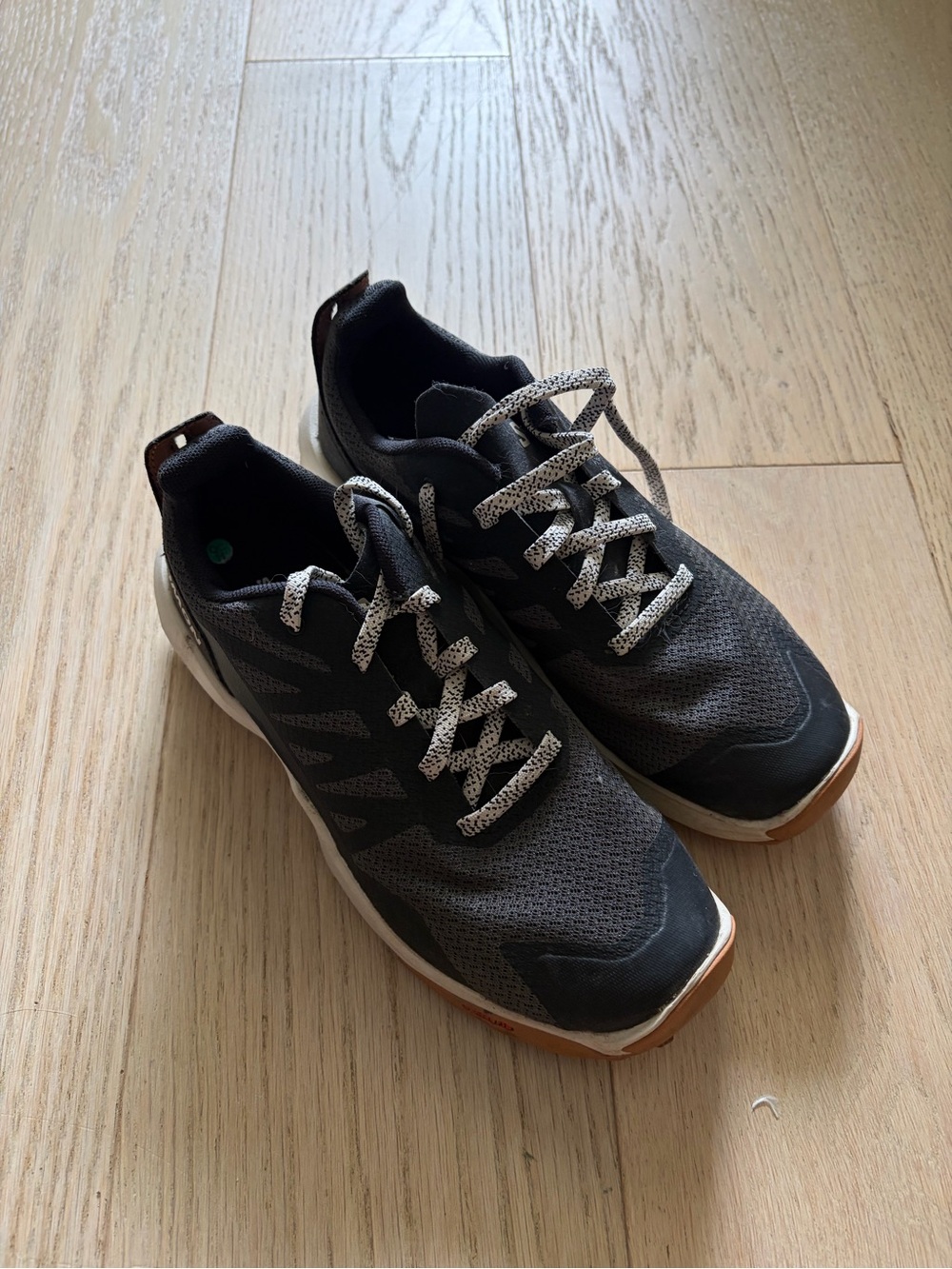 Youth size 5 Salomon trail running shoes
